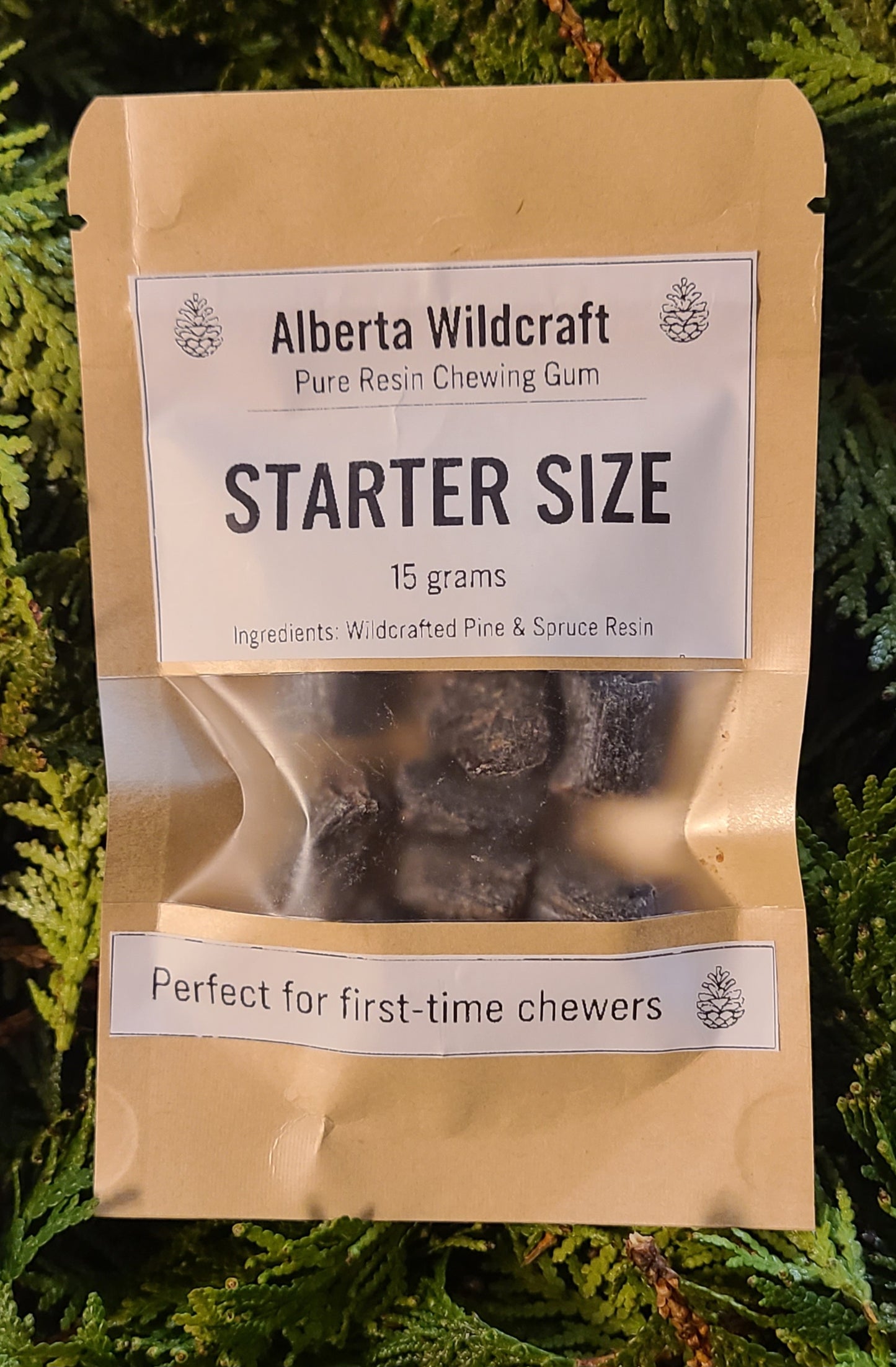 Package of Alberta Wildcraft pure resin chewing gum with text on a green leafy background