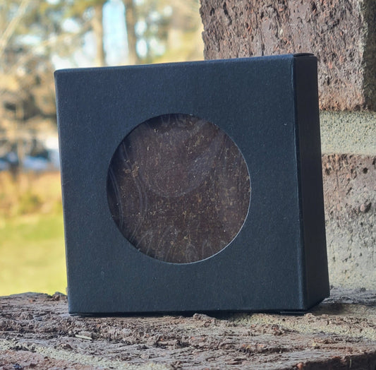 Spruce resin soap visible through packaging window